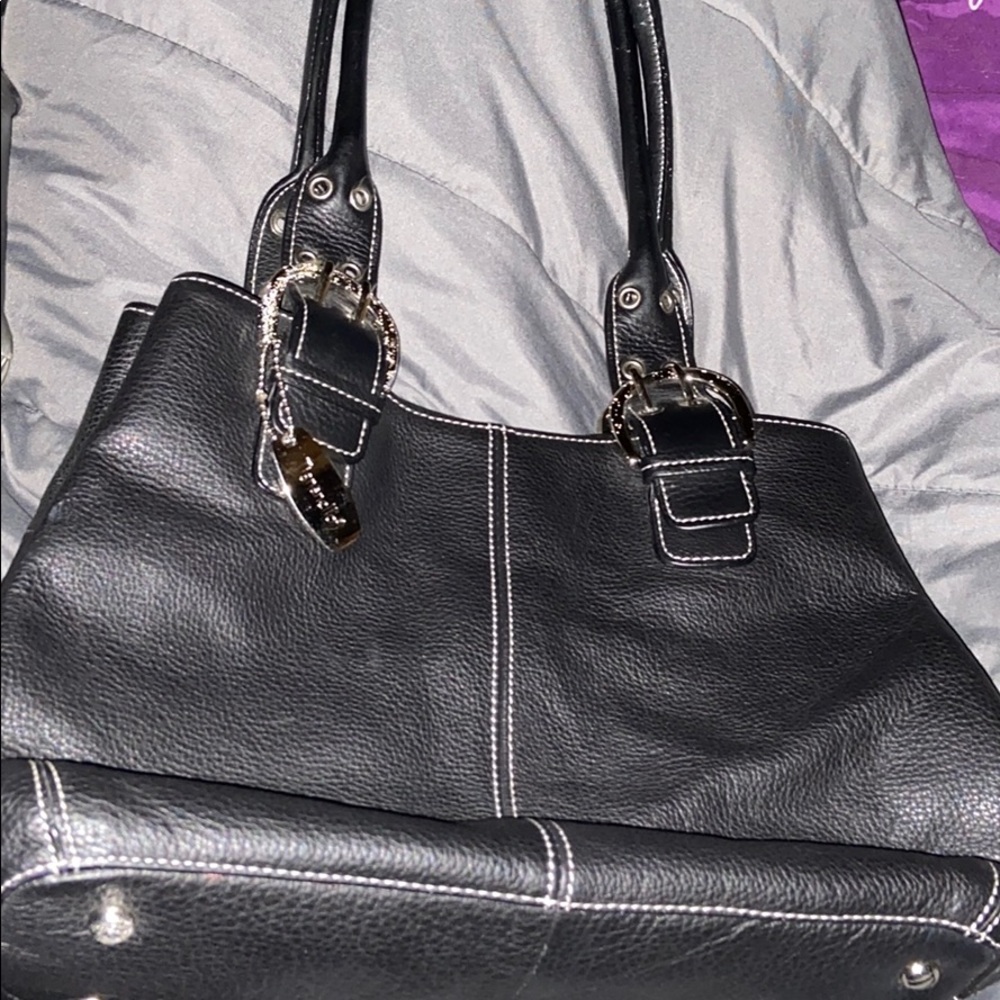 I am selling a tignanello purse.